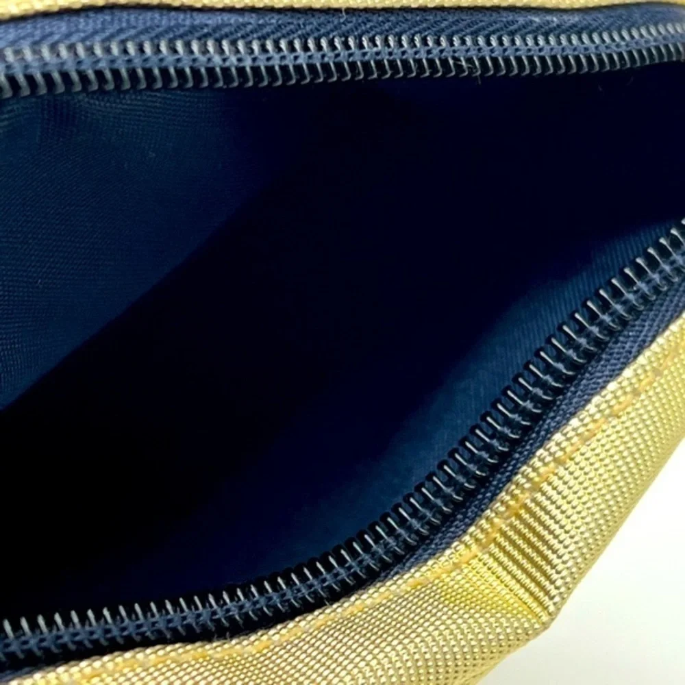 Babor gold & navy blue make up clutch